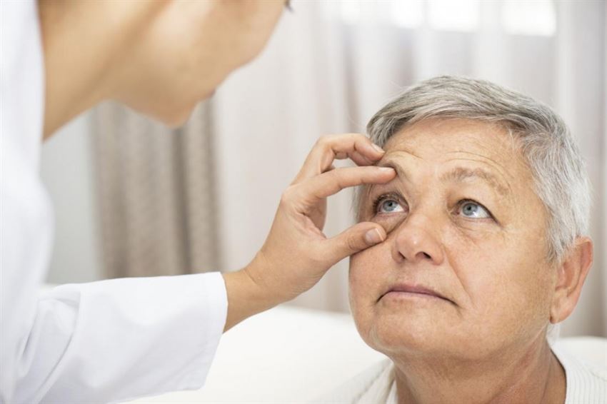 person-getting-eyes-examined-by-optometrist